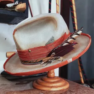 Distressed Fedora with Feathered and Metallic Accents Off-White with Orange Stripes